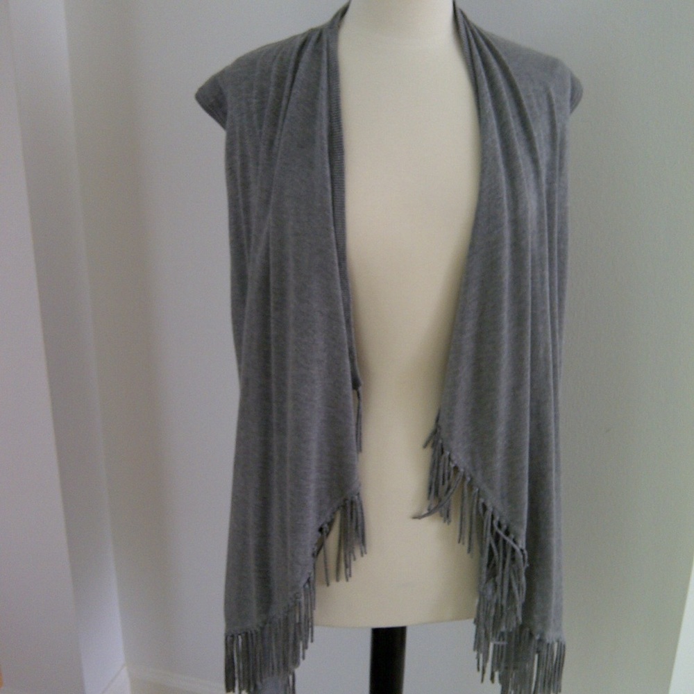 Shawl vest with fringe. Saks.
